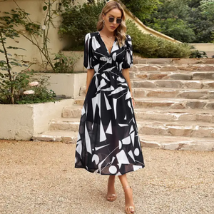 Kelly™ | Bloesem midi-jurk