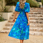 Kelly™ | Bloesem midi-jurk